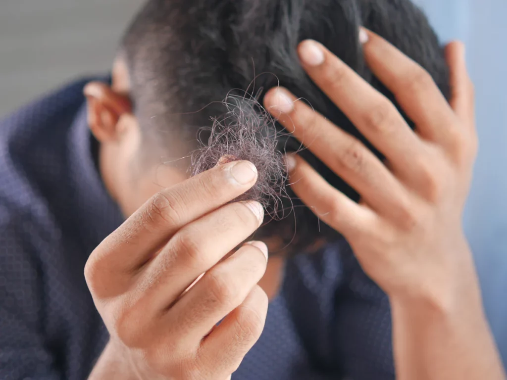 Man checking his hair